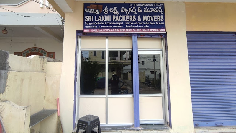 Dedicated Moving Truck Ready for Doorstep Loading - Sri Laxmi Packers and Movers Mancherial