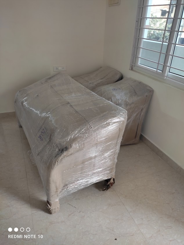 Doorstep Furniture Wrapping in Customer Residence - Sri Laxmi Packers and Movers Mancherial