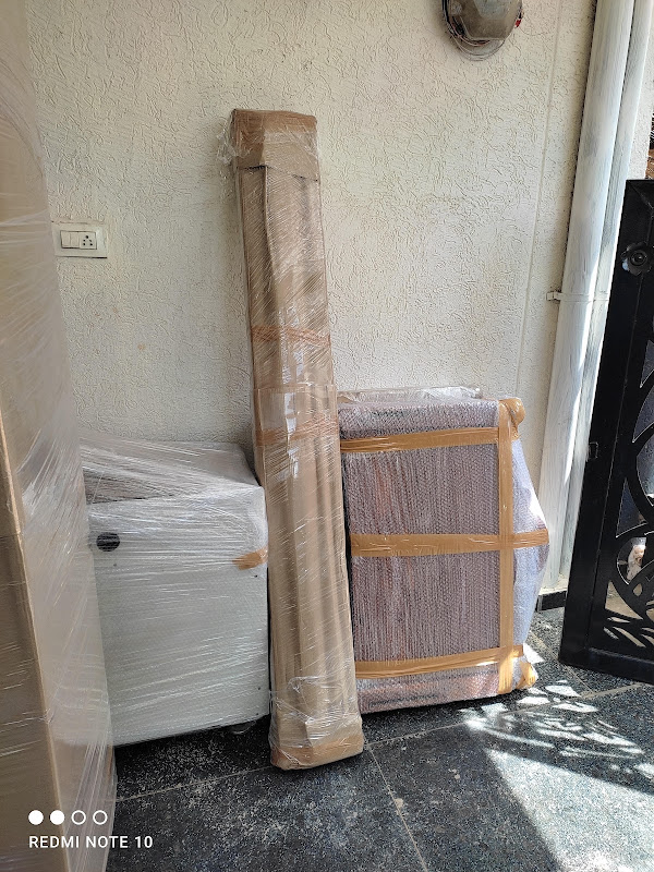 Teakwood Living Room Showcase Stretch & Foam Film - Sri Laxmi Packers and Movers Mancherial